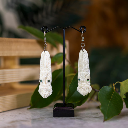 Bone Toki Earrings with Tiki Pattern