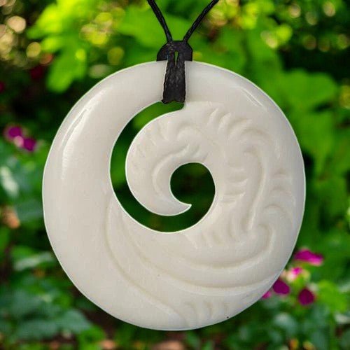 Bone Etched Closed Koru Pendant