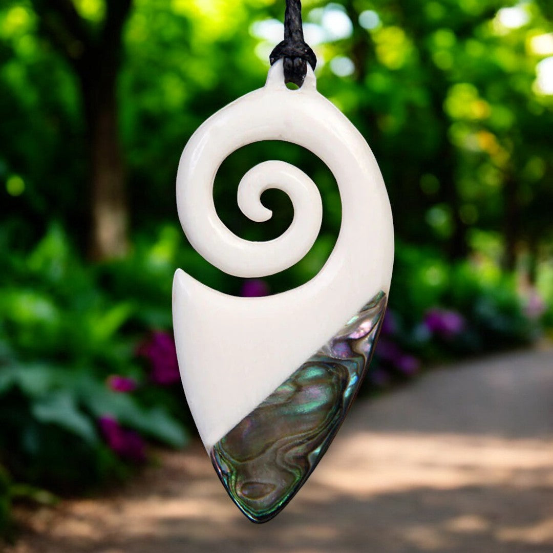 Bone Cornucopia Koru Pendant